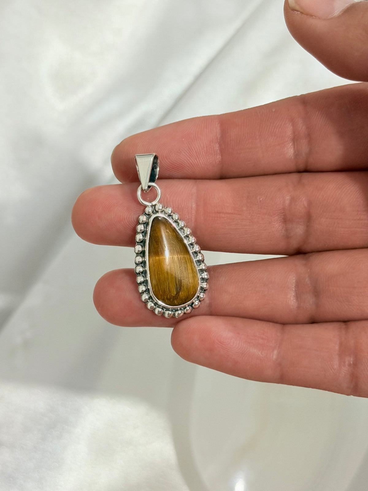 Dije Gota de Ojo de Tigre Natural en Plata .950